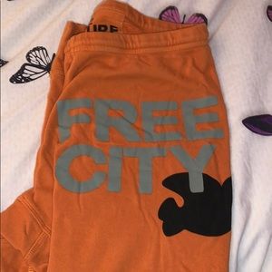 Orange free city sweatpants